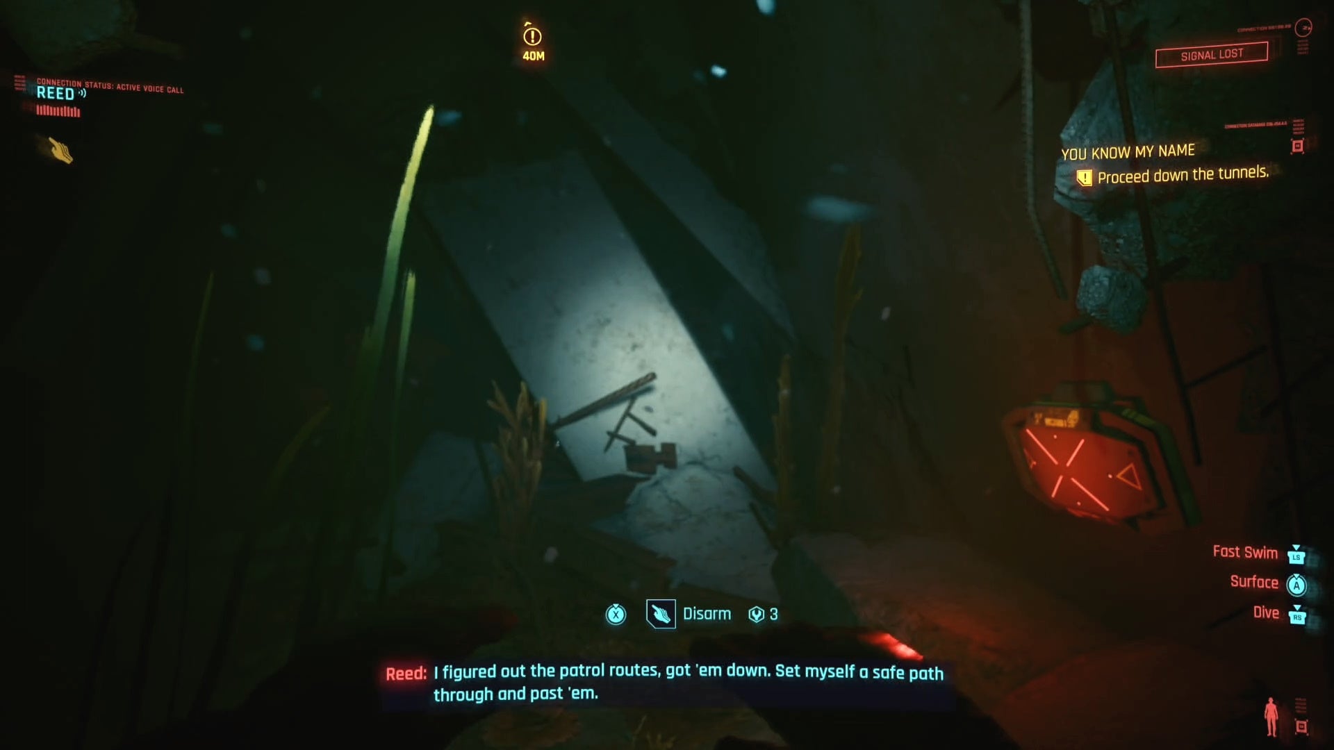 first person view of swimming underwater with the option to disarm a red mine in text