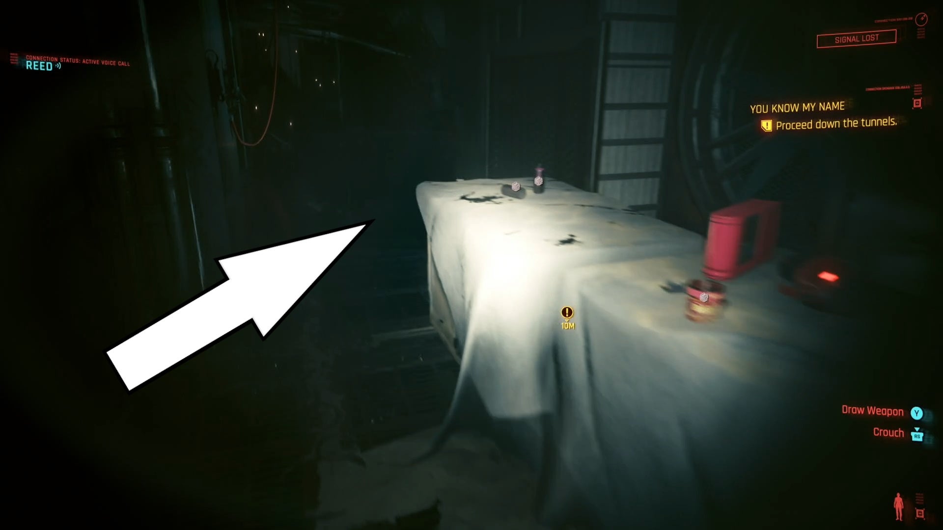 first person view of looking at a half flooded room with a white arrow pointing to the water