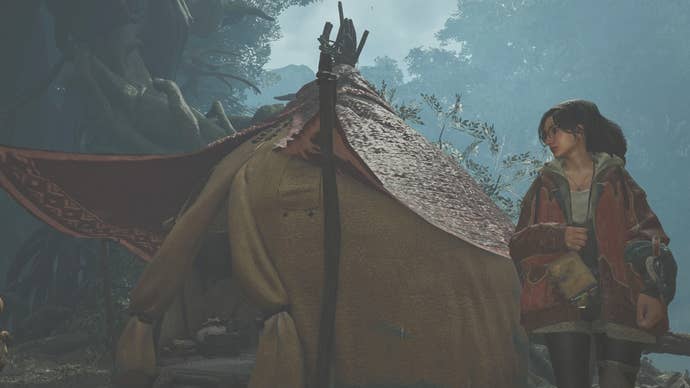 Alma standing beside a Pop-up Camp Tent in Monster Hunter Wilds.