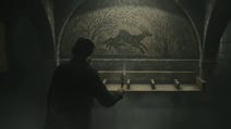 alan using the angel lamp in front of a wall with a picture of a deer in the forest in it in a dark rundown train station tunnel
