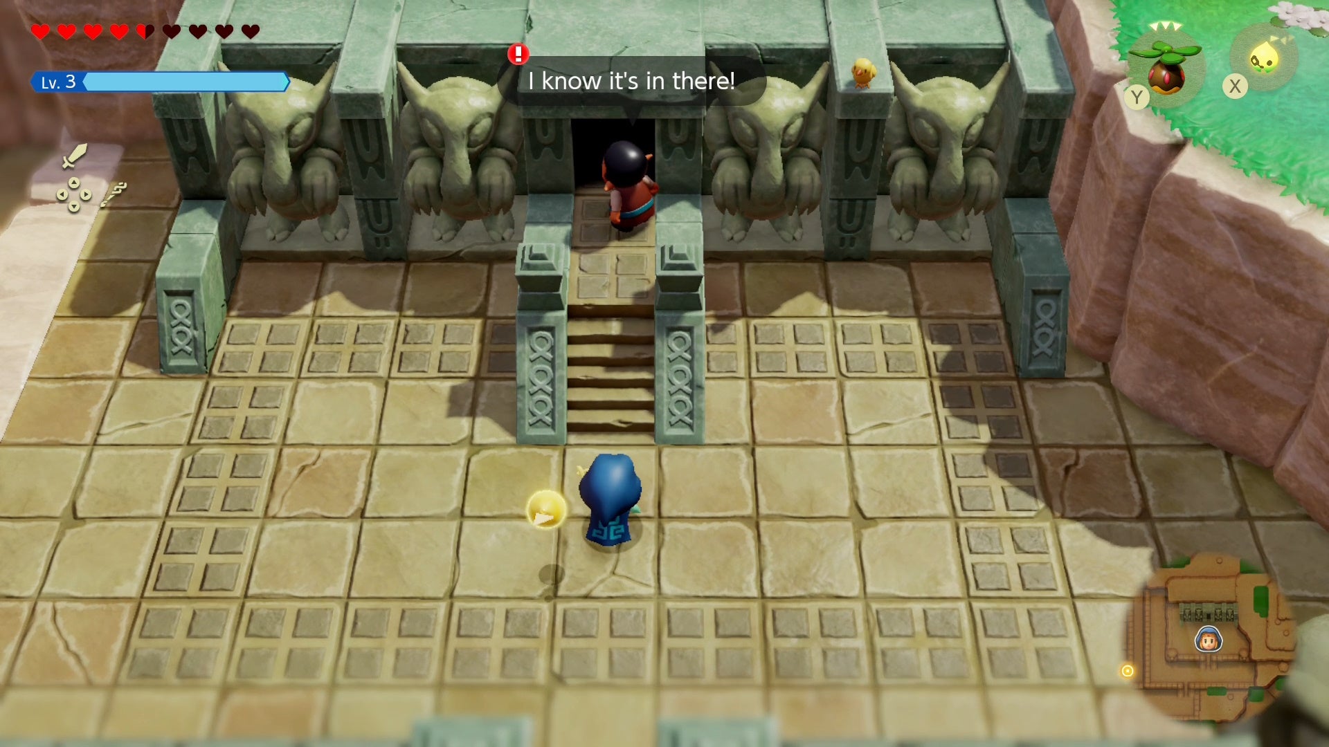 Zelda looking up at Sago atop the stairs to the Eastern Temple in Zelda Echoes of Wisdom.