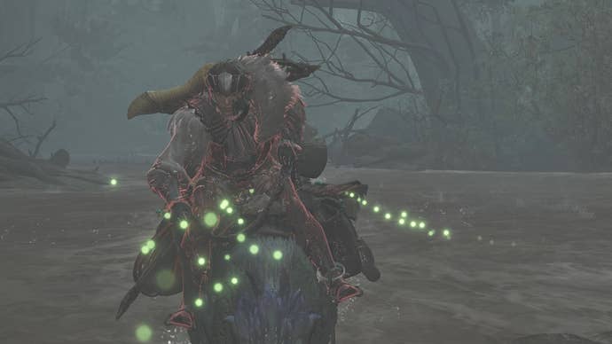 A male hunter riding a Seikret during a downpour in MonsterHunter Wilds.