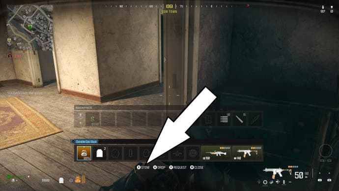 a white arrow pointing to the option to show a gas mask while inside a house in the urzikstan map