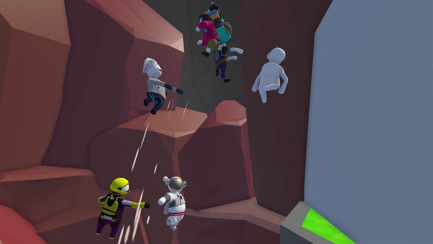 A group of co-op players try to manouvre up a mountain in Human Fall Flat. - 15