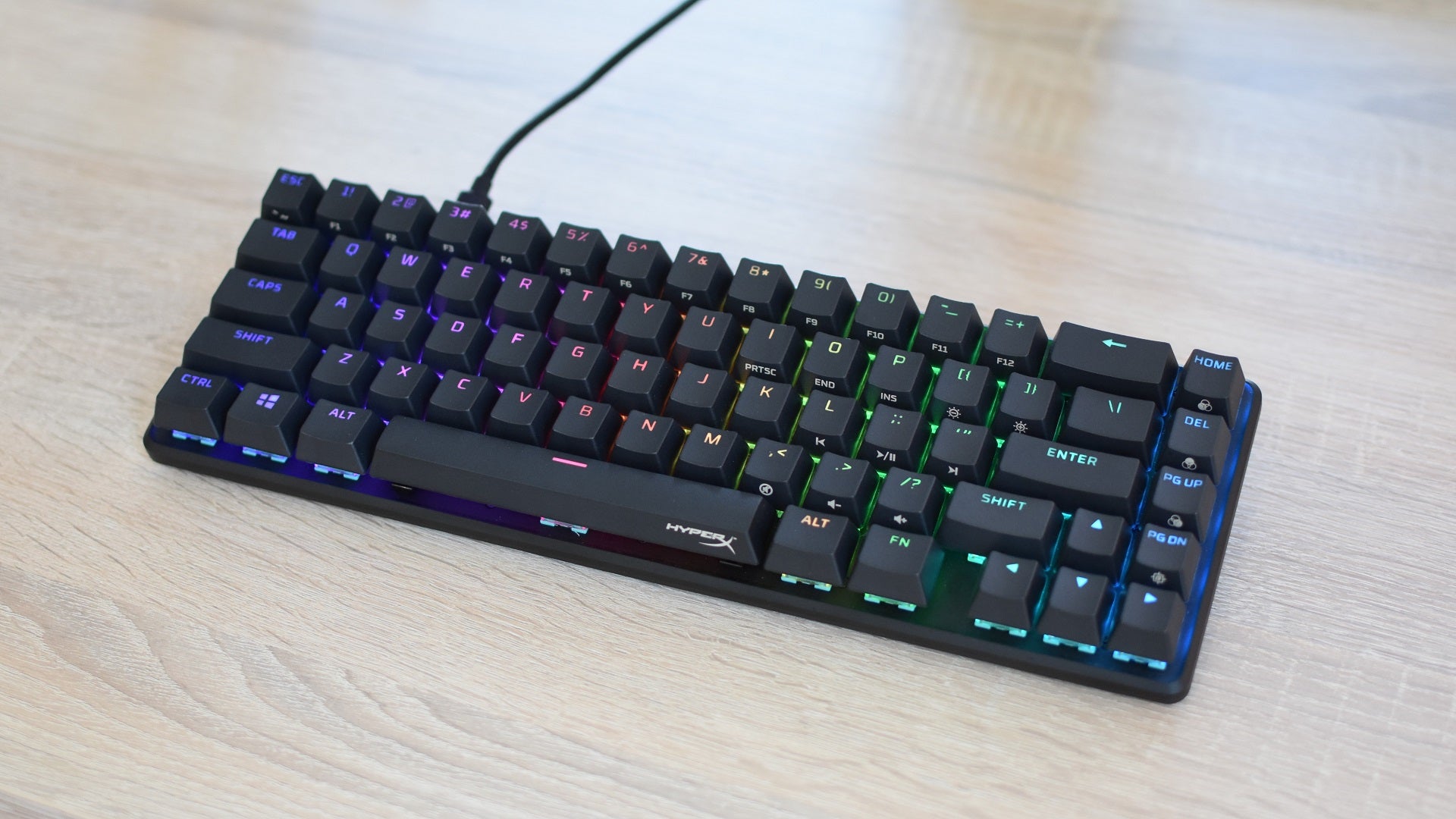 The HyperX Alloy Origins 65 on a desk.