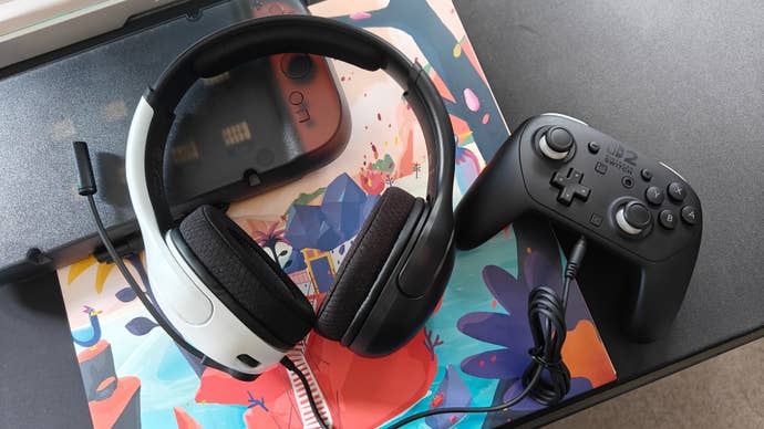 turtle beach airlite fit headset for switch 2, shown with a switch 2 pro controller