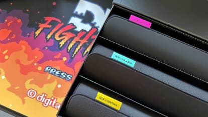 steelseries qck performance mouse pads in a case at an angle