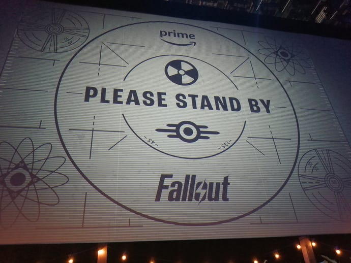 An image of a "please stand by" emergency broadcast title card at a Fallout TV show screening