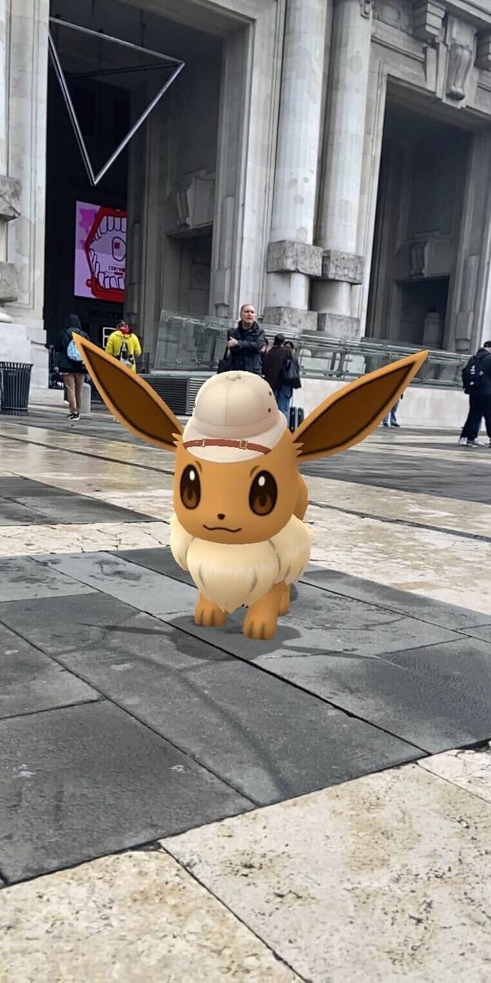 Pokémon Go in-game screenshot showing a safari Eevee.