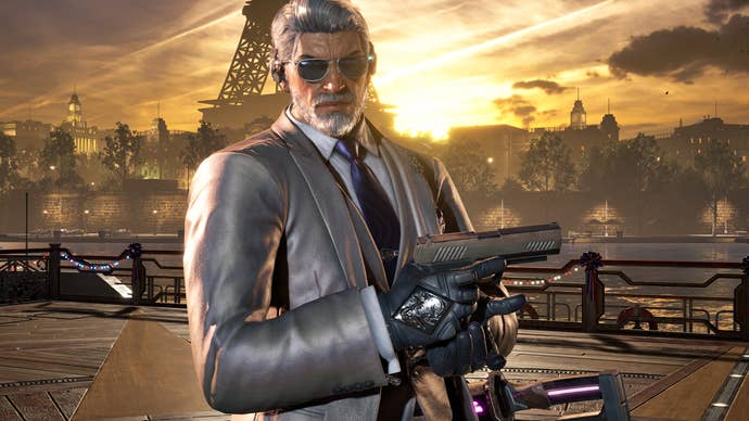 Victor Chevalier in Tekken 8 holding a pistol stares moodily at the camera in front of the Eiffel Tower. He is dressed is a silvery/grey suit with a tie and sunglasses completing the look.