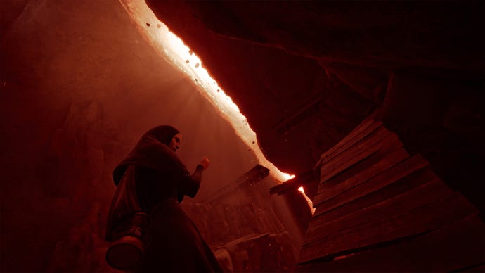 The player character in Indika approaching a light-filled gap in a dark interior.