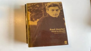 The cover of Hand to Mouth, a Paul Auster book