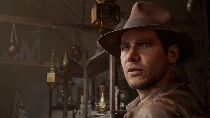 Indiana Jones and The Great Circle promo screenshot showing Indy in close up in front of some dusty shelves of old artefacts