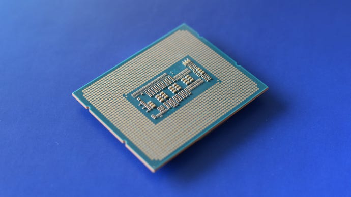 The underside of an Intel Core i5-14600K CPU, showing its contacts.