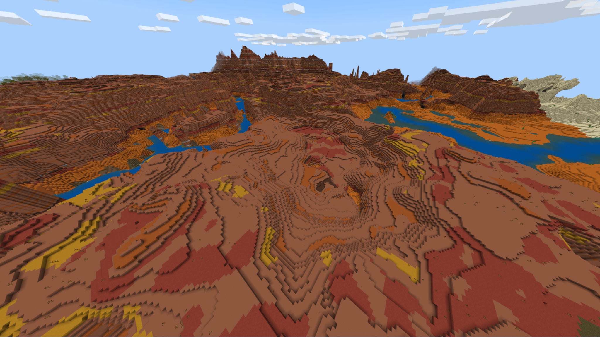 Screenshot of the 'Into the Badlands' Minecraft Seed showing an expansive Badlands biome. - 8