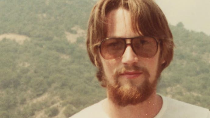 Photo of Jeff Minter as a young man, wearing sunglasses and a beard. The photo is yellowed, suggesting the 1970s or early 1980s.From Llamasoft: The Jeff Minter Story