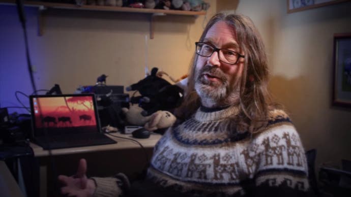 In Llamasoft: The Jeff Minter Story, Jeff Minter talks to the camera while wearing a jumper.