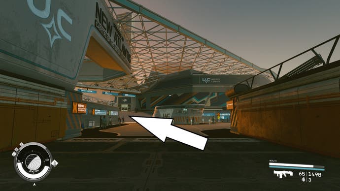 a white arrow pointing to the left of a split in a path at new atlantis spacesport