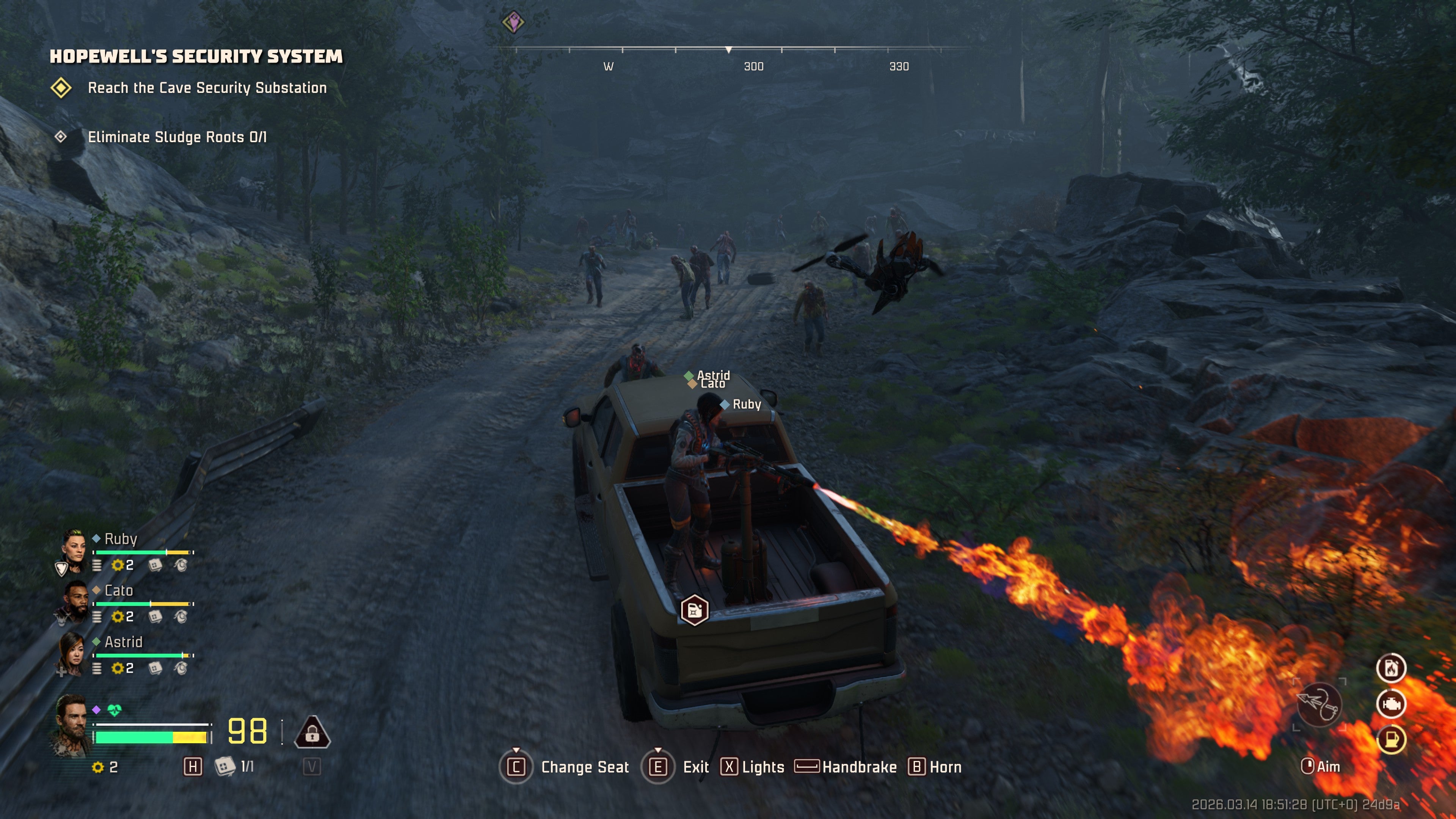 A screenshot of John Carpenter's Toxic Commando, showing the player driving a pickup truck as an NPC fires a flamethrower from behind.