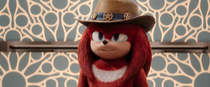 Knuckles, in live action, in the iconic three-star hat.