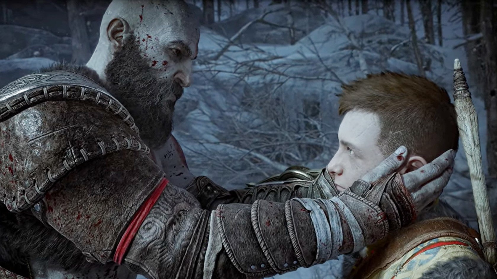 Kratos holds Atreus' face in his hands in God of War Ragnarok