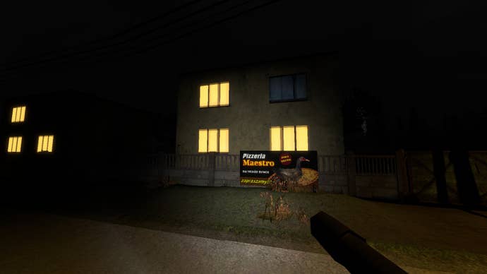 A street in Krypta FM with houses, windows lit brightly against the night, and a local pizza place ad on a fence.