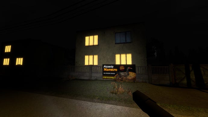 A street in Krypta FM with houses, windows lit brightly against the night, and a local pizza place ad on a fence.