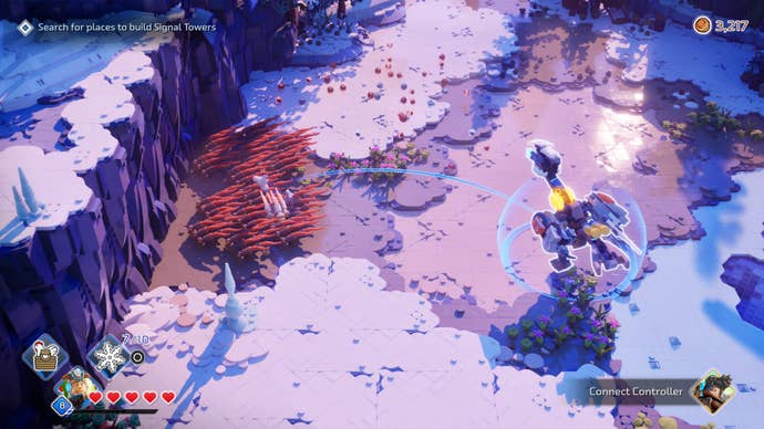 A Lego figure hides in tall grass in a snowy battle scene in Lego Horizon Adventures.