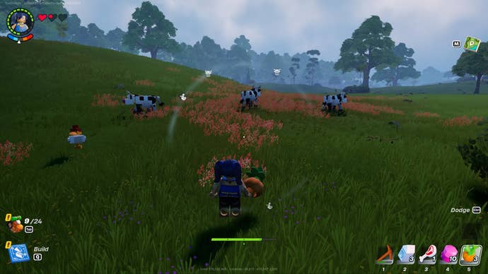 The player approaches some cows and chickens with a Pumpkin in hand in LEGO Fortnite