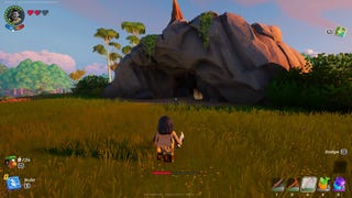 The player faces the entrance to a cave in LEGO Fortnite