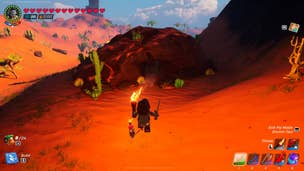 A player faces a cave in the Dry Valley biome in LEGO Fortnite