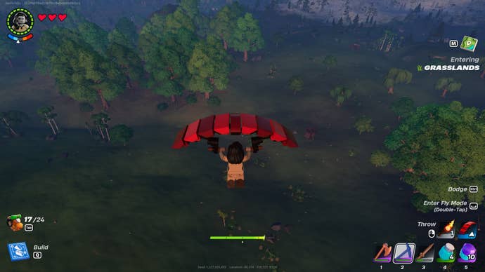 The player uses the Glider to glide across the Grasslands biome in LEGO Fortnite