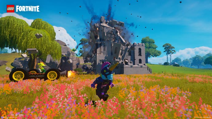 Lego Fortnite screenshot showing a building collapsing after exploding.
