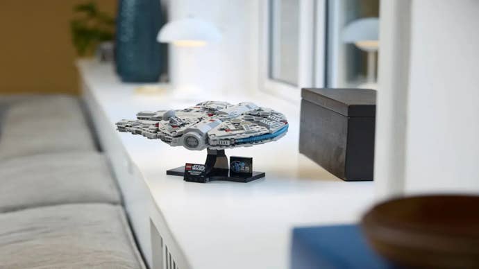 LEGO set 75375, a smaller Millenium Falcon, is shown on display on a windowsill