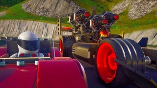 Two lego people drive side by side in lego cars in Lego 2K Drive