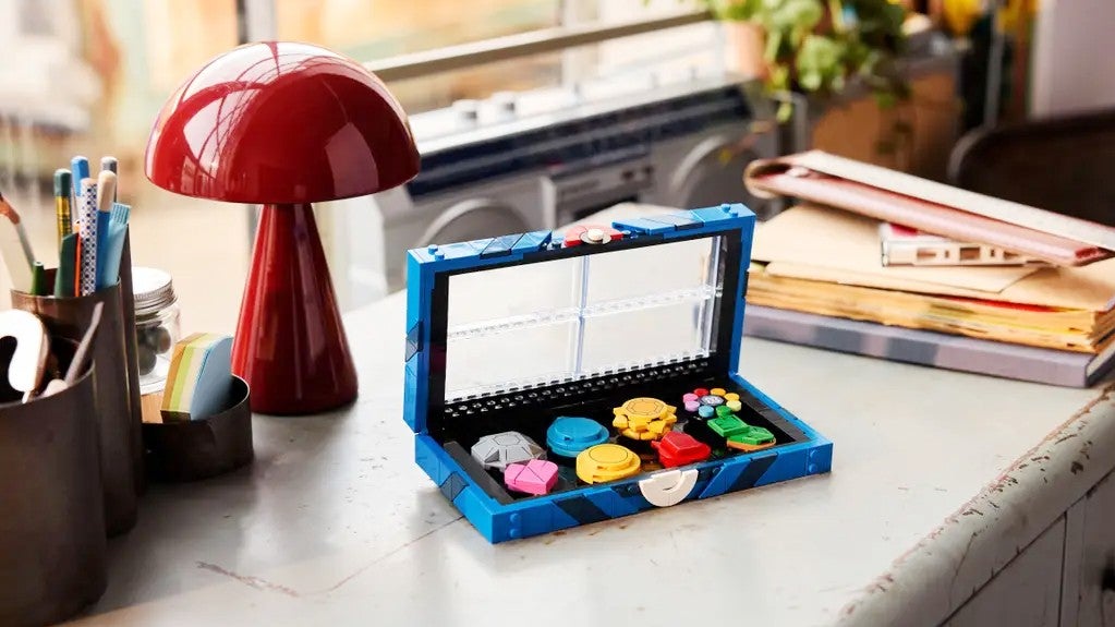 Lego Kanto Region Badges Collection on a desk