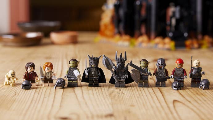 The Lord of the Rings minifigures from left to right: Gollum, Frodo, Sam, Orc, Mouth of Sauron, Sauron, Orc, Uruk Hai, Uruk Hai and Gothmog.