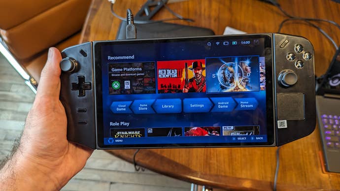 A Lenovo Legion go being held in one hand.