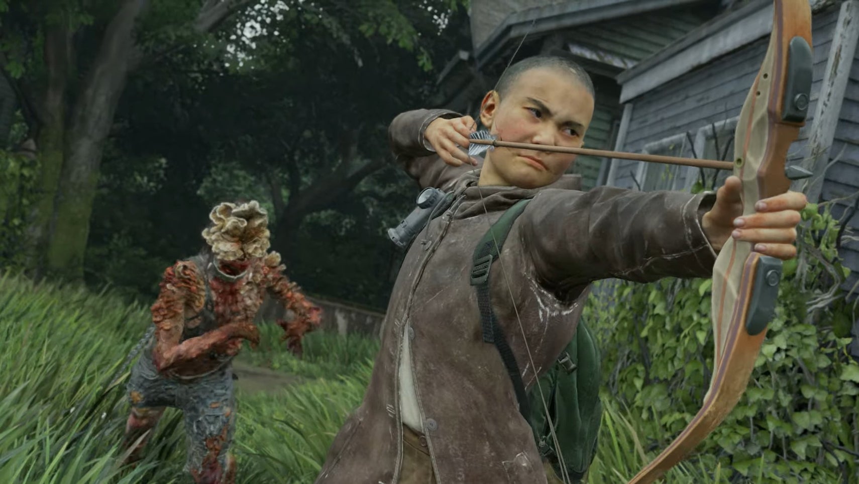 Lev in The Last of Us Part 2 Remastered No Return pulling back on their bow as an infected enemy strains against chains in the background