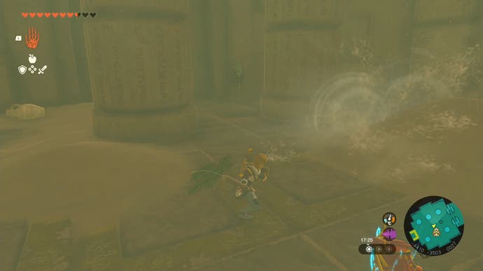 Link using a Korok-Frond Guster on a sand pile to reveal a switch in the Lightning Temple.