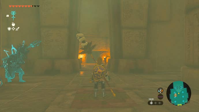 Link standing on a switch to open a gate in the Lightning Temple.