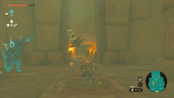Link standing on a switch to open a gate in the Lightning Temple.