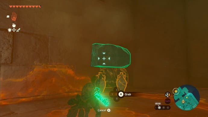 Link using his Ultrahand ability to move stone slabs in the Lightning Temple in Tears of the Kingdom.