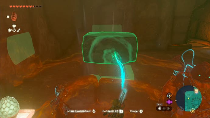 Link using his Ultrahand ability to move a stone slab as he heads towards the second battery location in the Lightning Temple.