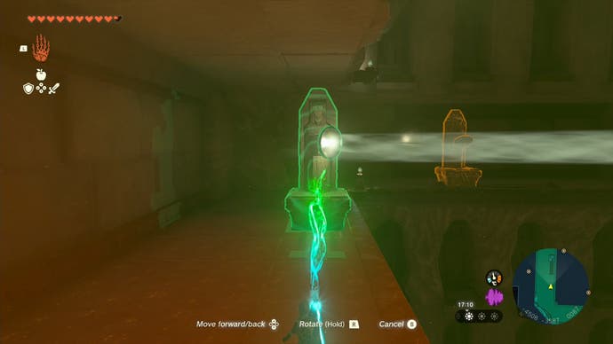 Link moving a statue to change the direction of a beam of light in the Lightning Temple in Tears of the Kingdom.