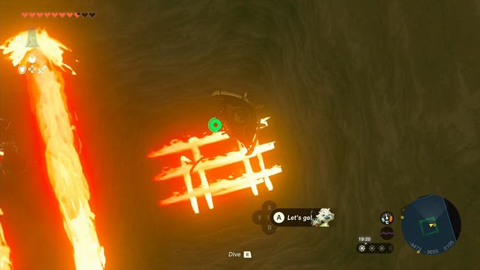 Link gliding towards flames and the location of the third battery in the Lightning Temple.