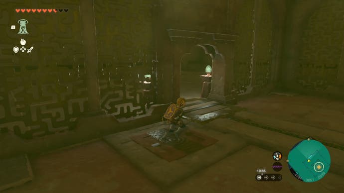 Link standing on a switch so Riju can enter a room where the Lightning Temple's third battery is located.