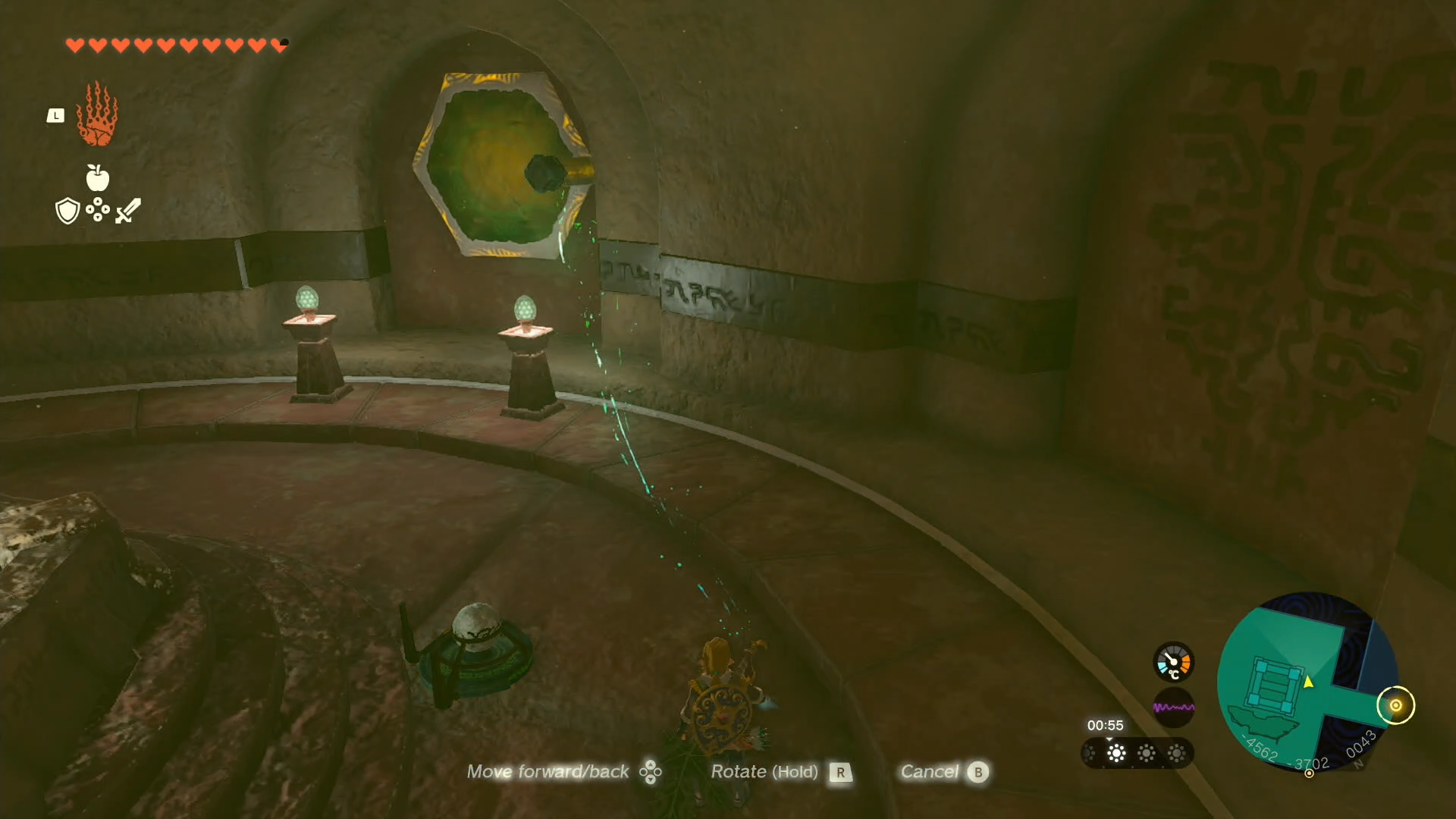 Link using his Korok-Frond Guster on a sand pile to reveal a large spike in the Lightning Temple.