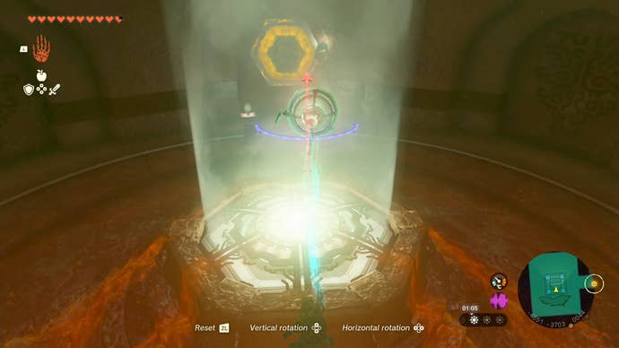 Link using his Ultrahand ability to lift a mirror to a light source in the Lightning Temple in Tears of the Kingdom.