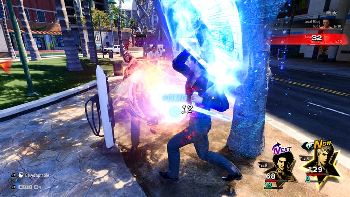 Kiryu attacks a hoodlum with his Essence of Tonfa move in Like a Dragon: Infinite Wealth.
